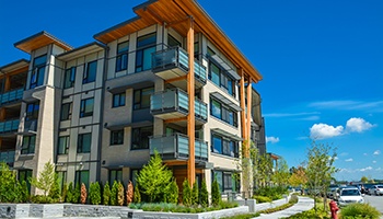 a large four-story apartment building