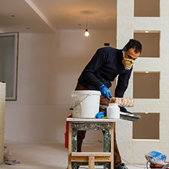 Team member working inside of home