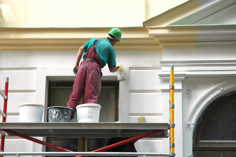 man exterior painting