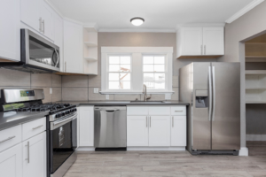 a kitchen filled with stainless steel appliances 