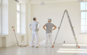 a team painting a commercial space
